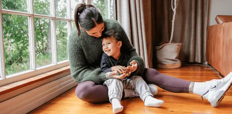 Mother and son cuddling